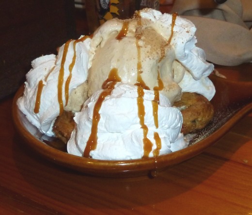 Ice Cream from Love & War Restaurant Large dish of ice cream drizzled with Caramel Sauce from Love & War