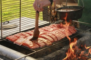 Taku Basting Salmon Takuy Lodge basting salmon