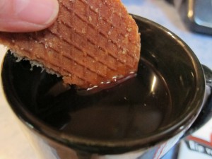 Rip van wafels coffee dunking Rip van wafels dunking into cup of coffee