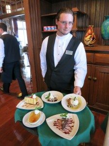 Crater Lake Waiter with desserts A waiter shows off Crater Lake Lodge's beautiful desserts.