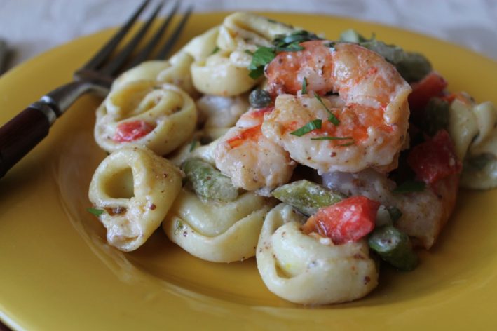 Shrimp and Tortellini Salad with Sauce Ravigote Recipe Shrimp and Tortellini Salad with Sauce Ravigote on yellow plate with silver fork