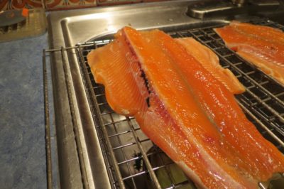 Trout drying before smoking Allowing the trout to dry for 30 minutes after brining creates a pellicle, a think glaze.