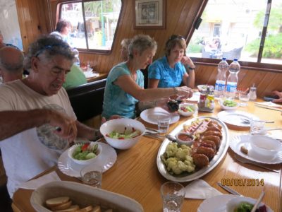 Guests aboard the Linda dig into to another of Nano's sumptuous meals.