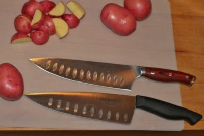 You can see the difference in the ergo handle versus the traditional straight handle.
