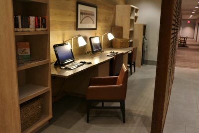 The business center offers computers and printers.