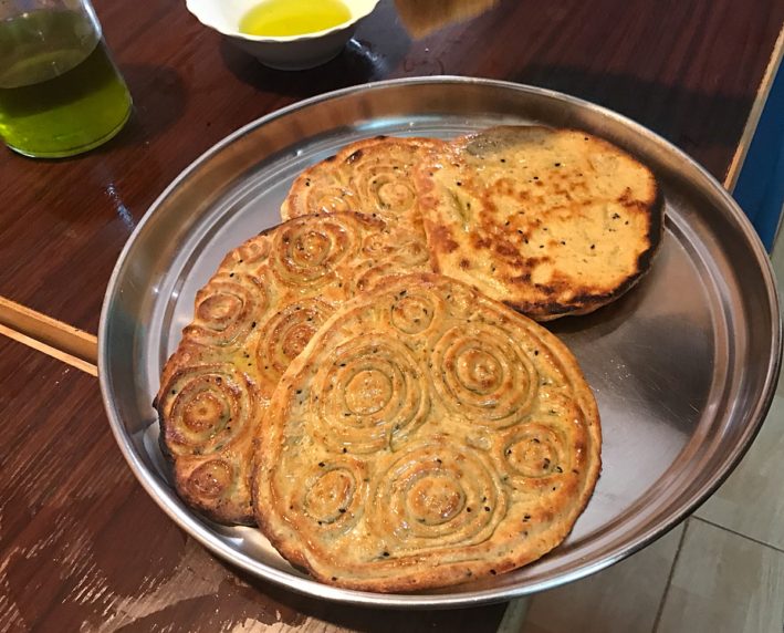 Flatbread made with olive oil on the olive trail in Jordan.