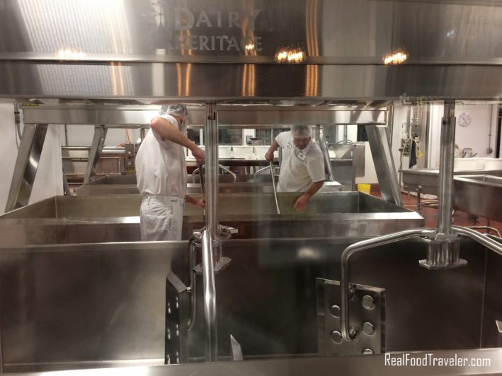 Get to know the cheese of Door County by observing the cheese factory in the cheese shop.
