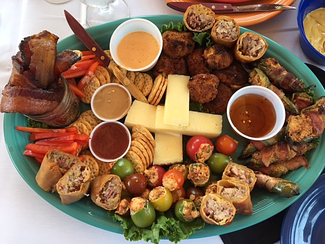 When staying at Massanutten Resort, enjoy a Mountain PuPu Platter with egg rolls, veggies, bacon and more.