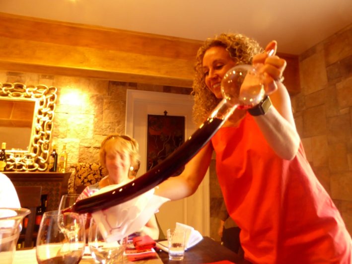Getting a taste of various wines in a dramatic way at Vezer Family Wineries