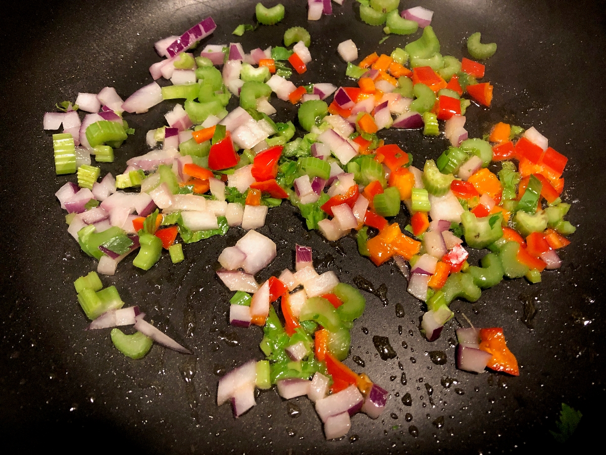 AKA the Trinity, onions, celery and red peppers diced and sauteeing for the Alaskan Salmon recipe.