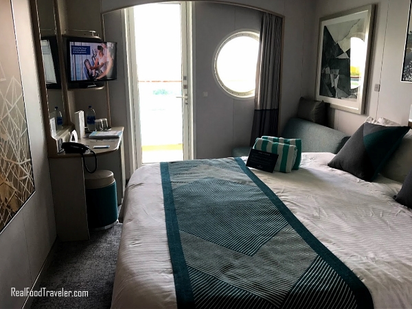 A stateroom with a balcony on Norwegian Sky cruise ship.