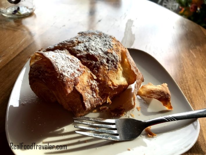 A flaky croissant made from scratch at NutMeg Spice.