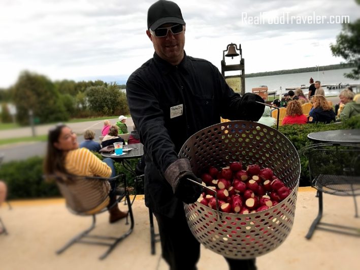 Tom, at Rowley's Bay shows off the pot of potatoes for the Fish Boil.