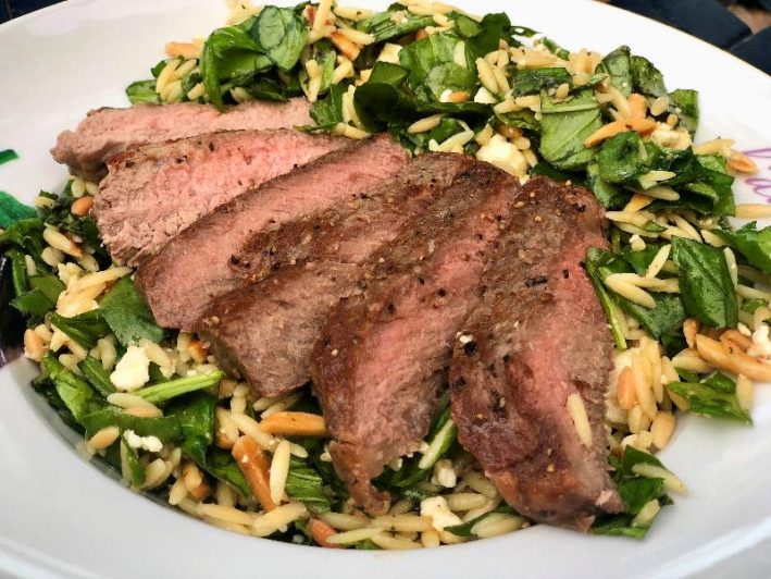 Greek Orzo Pasta Salad with Basil and grilled steak