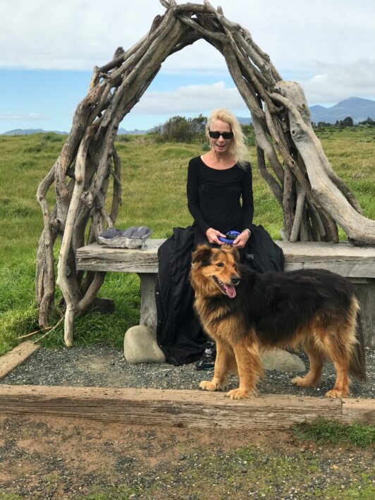 Writer Carole Jacobs and her dog on the Arch Bench at Fiscalini Ranch Preserve.