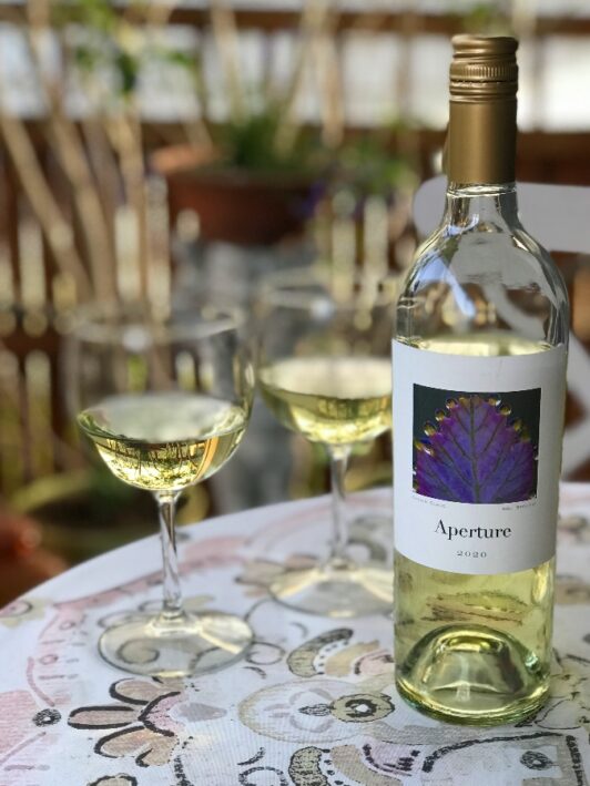 Bottle of Aperture Cellars wine and glasses.