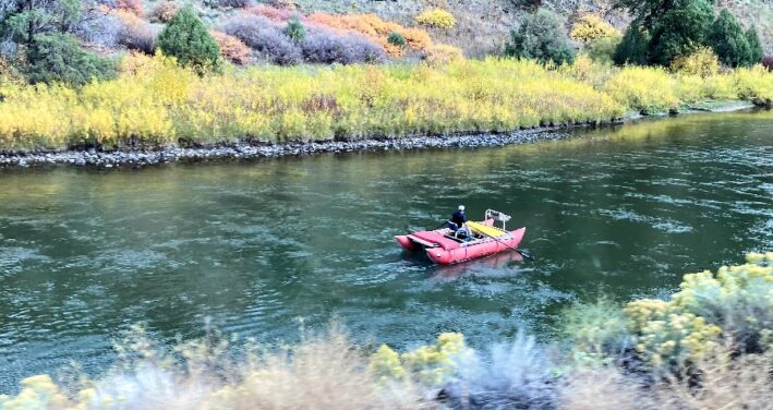 A raft on the Colorado River, seen from the Rocky Mountaineer Route.
