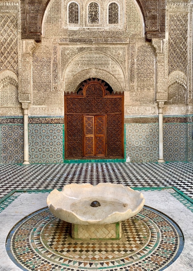 Al-Attarine fountain is seen in Fez travel.