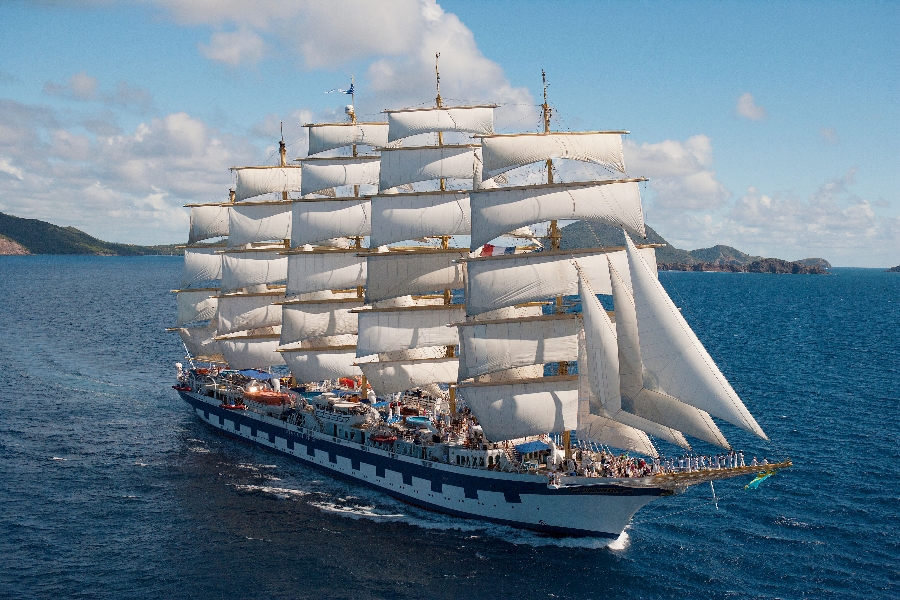 Clipper ship cruise with sails