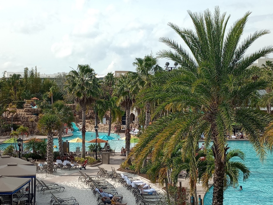 Pool and sandy beach at Loews Sapphire Falls Resort.