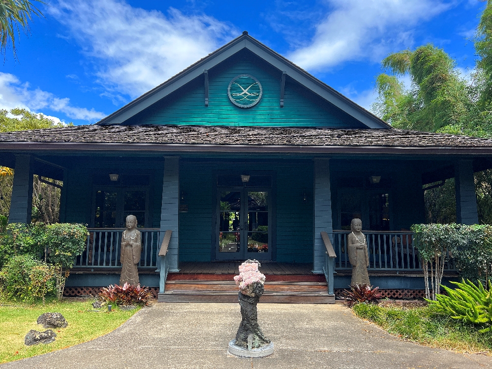 The green main house of Lumeria Maui.