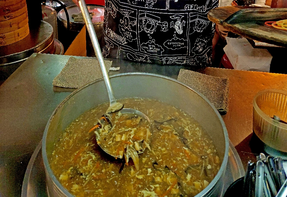 Hot and Sour Soup paired with pork dumplings in a Taiwan Night Market.