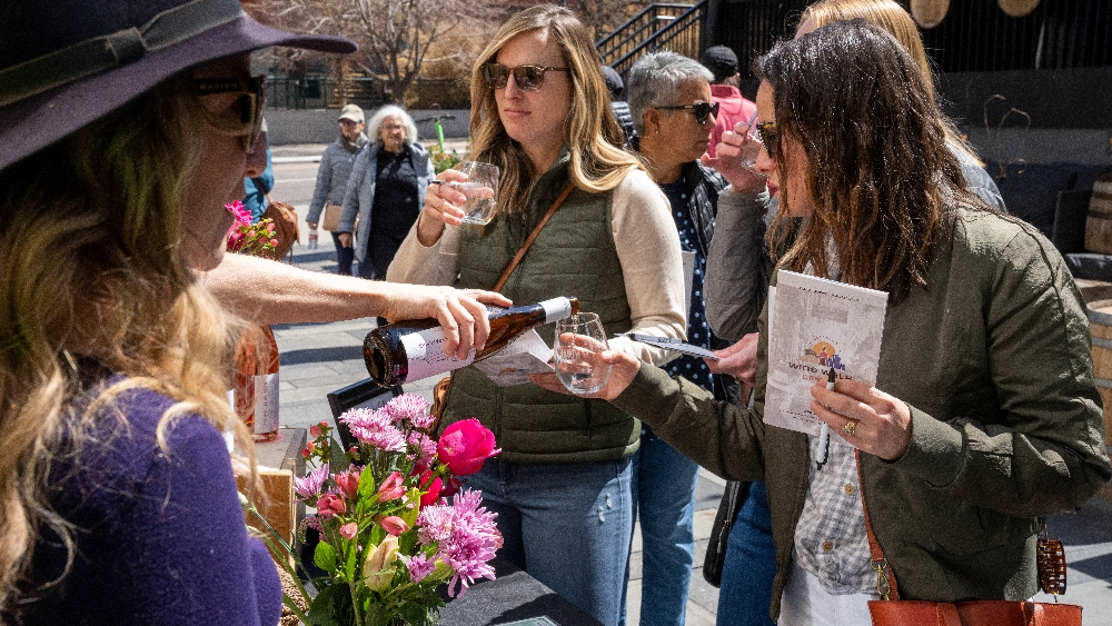Women sampling wine at the Colorado Wine Walk.