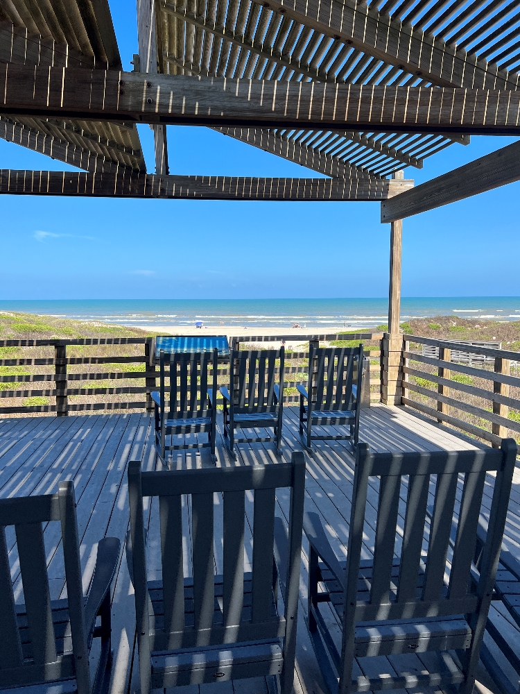 Rocking chairs on patio of Padre Island nature preserve.