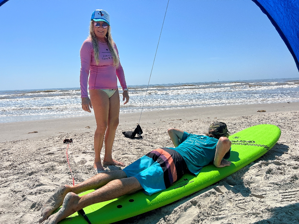 Learn to surf with the Texas Surf Camps.