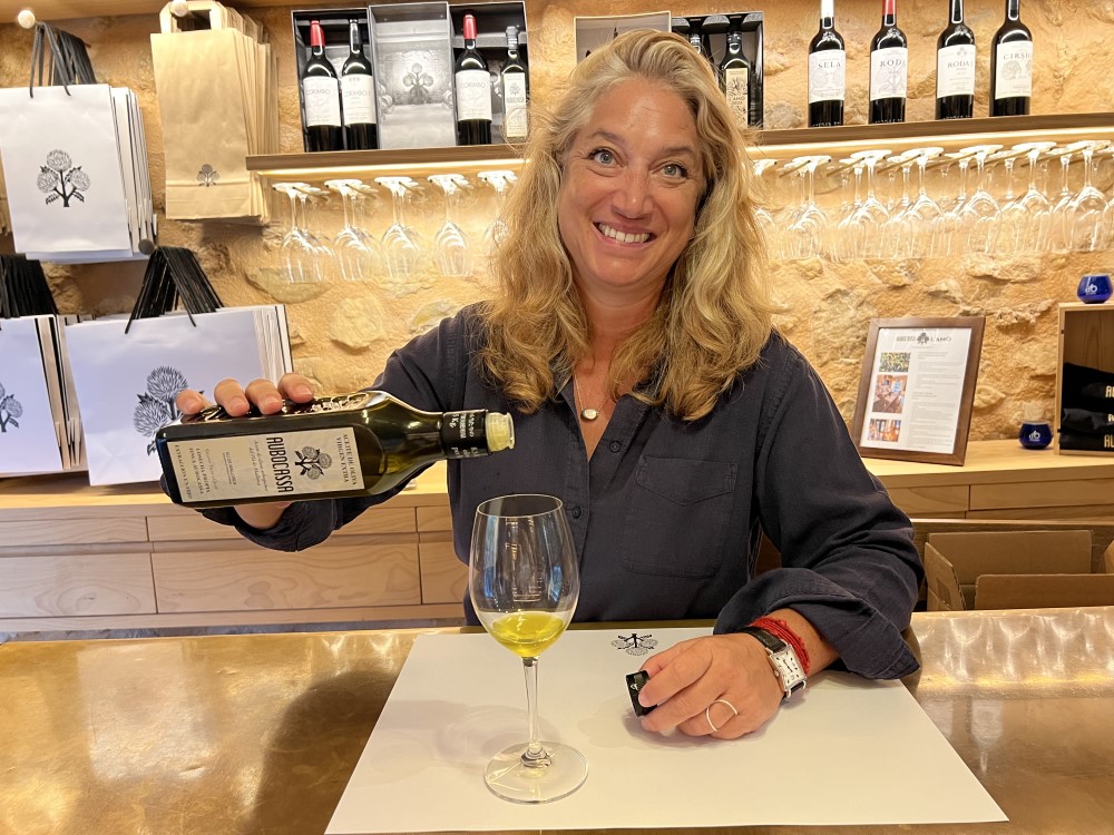 Tiffany Blackman, manager at Aubocassa pours a tasting of olive oil.