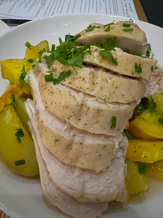 Herbed roasted chicken with zucchini, new potatoes, Quincy Exchange