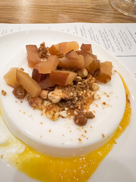 Panna cotta with coconut milk and seasonal fruit compote, Quincy Exchange,