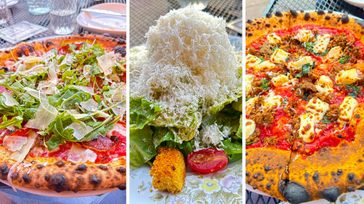 Pizza and parmesan-covered salad from Pizzeoli Wood Fired Pizza in St. Louis. Missouri.