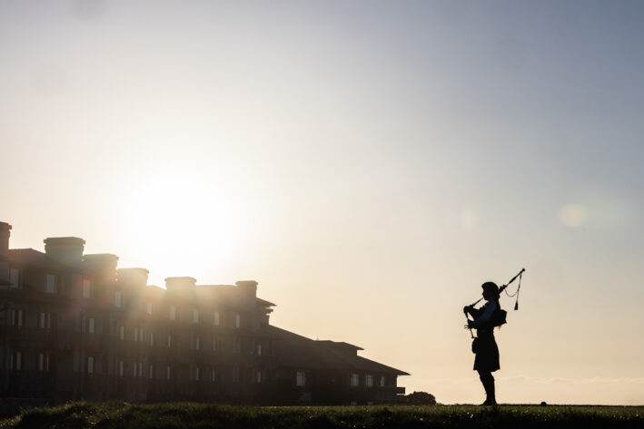 At Spanish Bay, a bagpiper plays at sunset. Photo courtesy of Mower PR.