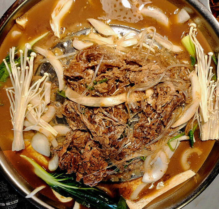 A savory pot of bulgogi at Korean Grill Restaurant in Seoul.jpg