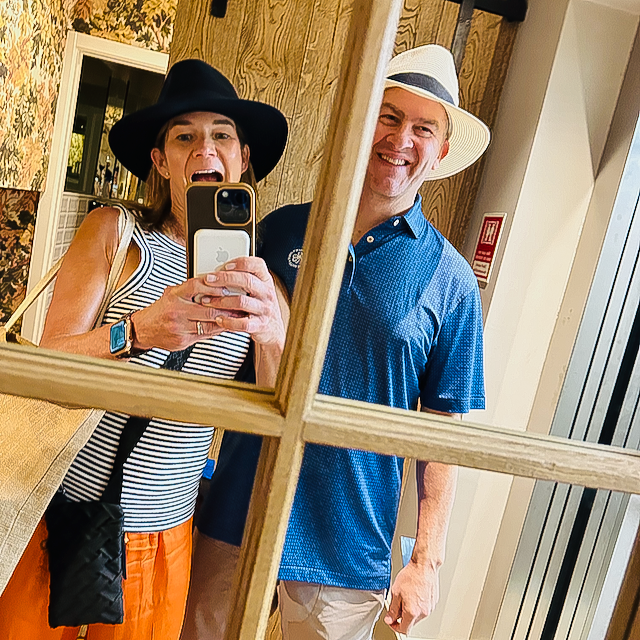 Abbey Algiers and her husband Eric in an elevator of the Alma Lusa Hotel.