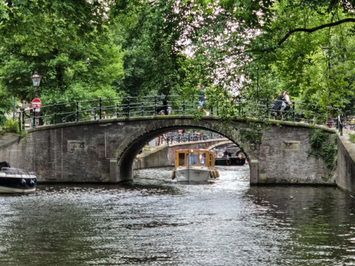 Series of bridges over canal in Amsterdam.