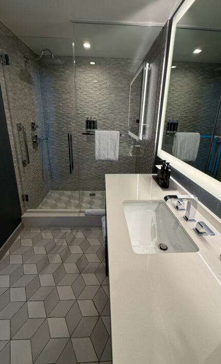 Bathrooms are spacious with large showers.