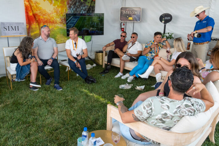 People in a lounge at the Denver Food + Wine Festival.