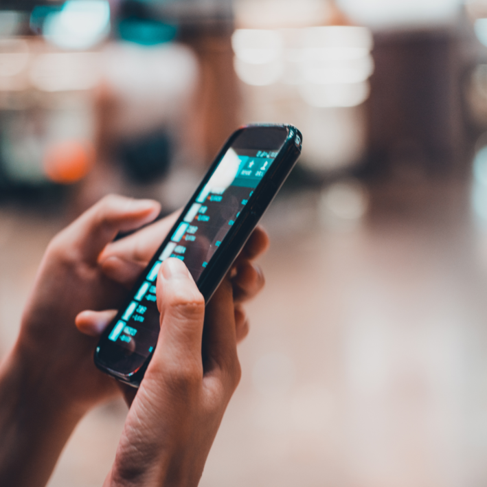 Person holding cell phone